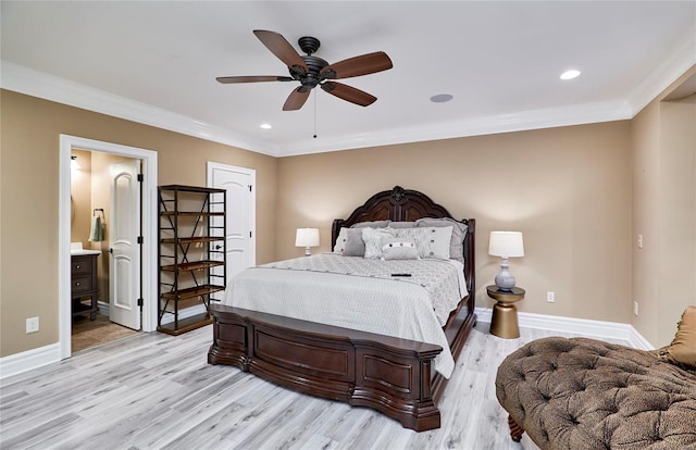 bedroom featuring ornamental molding, ensuite bathroom, ceiling fan, and light hardwood / wood-style floors