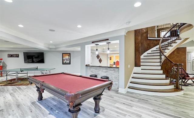 recreation room with billiards and light hardwood / wood-style floors