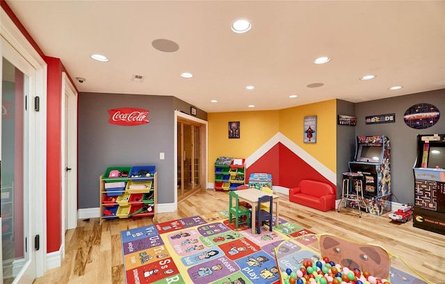 playroom with hardwood / wood-style floors