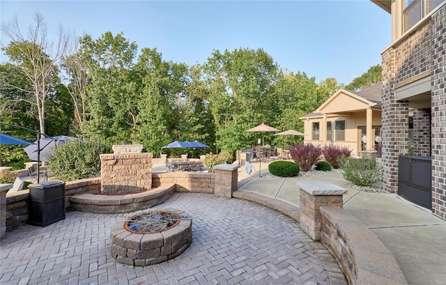 view of patio featuring a fire pit