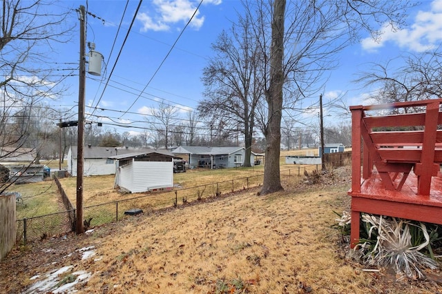 view of yard with a storage unit