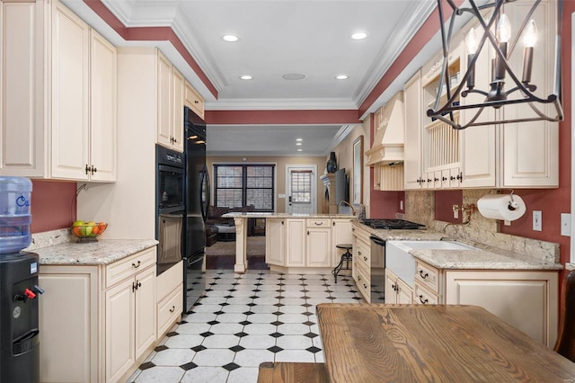 kitchen featuring premium range hood, decorative light fixtures, decorative backsplash, crown molding, and light stone countertops