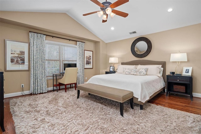 bedroom featuring lofted ceiling, wood-type flooring, and ceiling fan