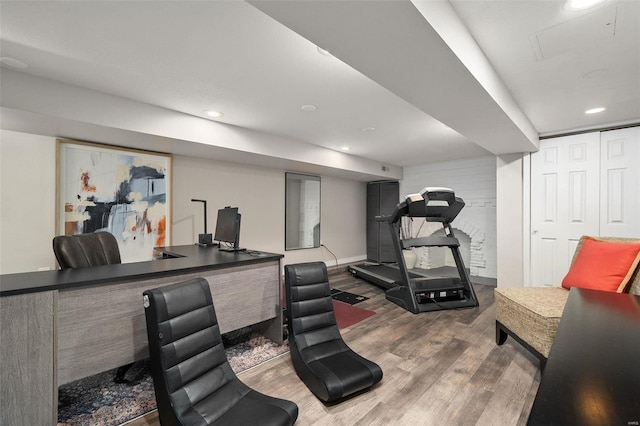 workout area with dark hardwood / wood-style flooring