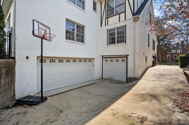 view of side of property featuring a garage