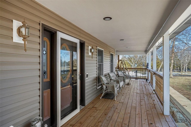 deck featuring covered porch