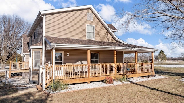 rear view of house with a deck