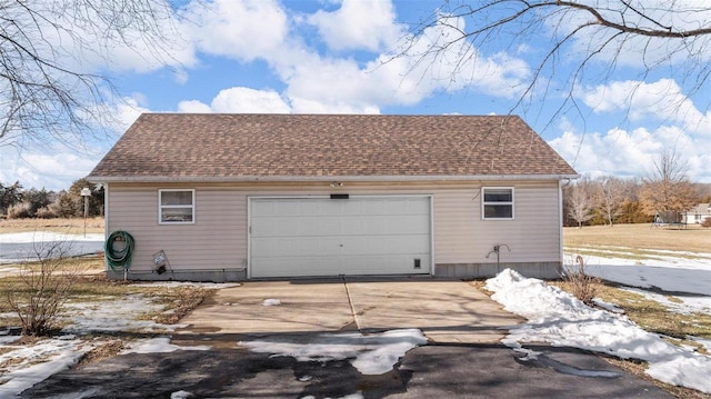 view of snow covered garage