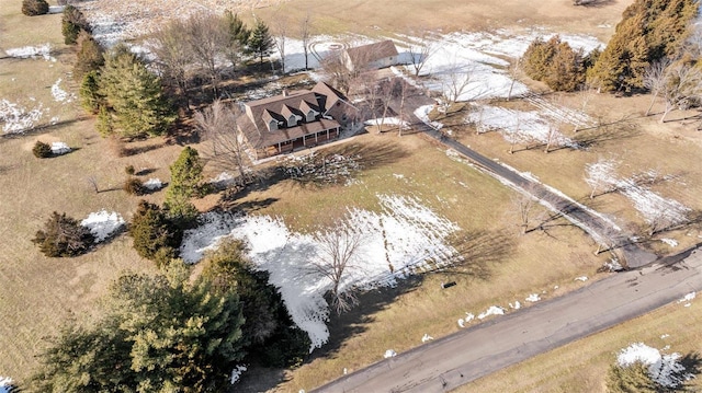 birds eye view of property featuring a rural view