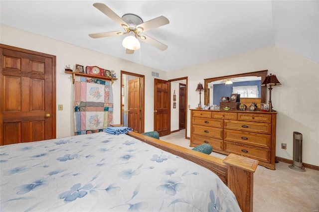 bedroom with light carpet and ceiling fan