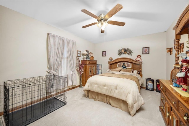 bedroom with light colored carpet and ceiling fan