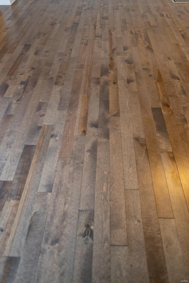 interior details featuring parquet flooring