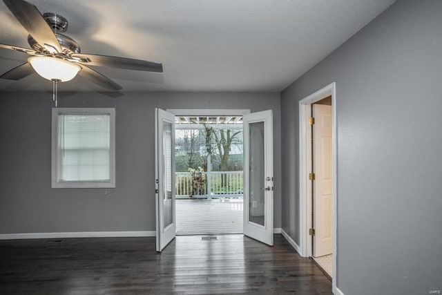 doorway to outside featuring french doors, ceiling fan, and dark hardwood / wood-style flooring