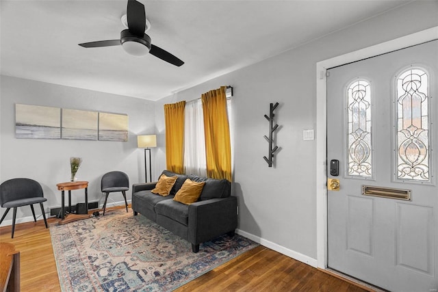 foyer entrance featuring ceiling fan and hardwood / wood-style floors