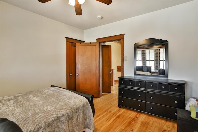 bedroom featuring ceiling fan and light wood-type flooring