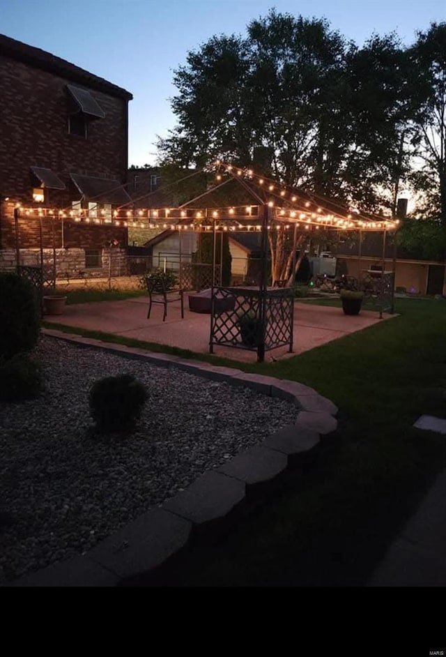 exterior space featuring a patio and fence