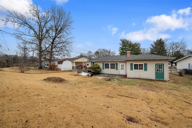 view of front of property with a patio area and a front yard