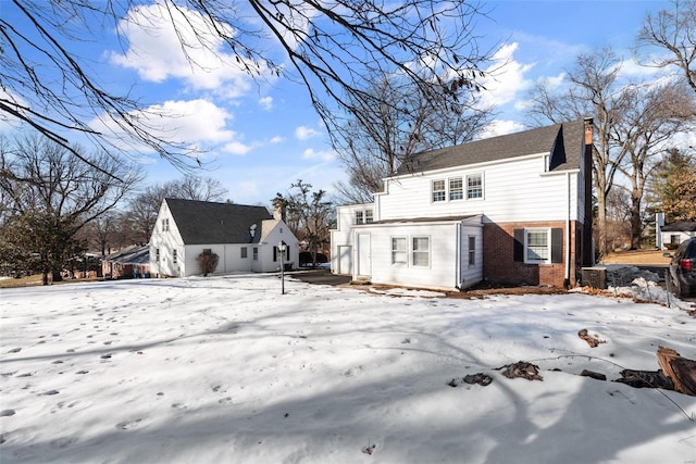 view of snow covered property