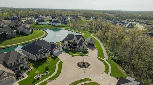 aerial view with a water view and a residential view