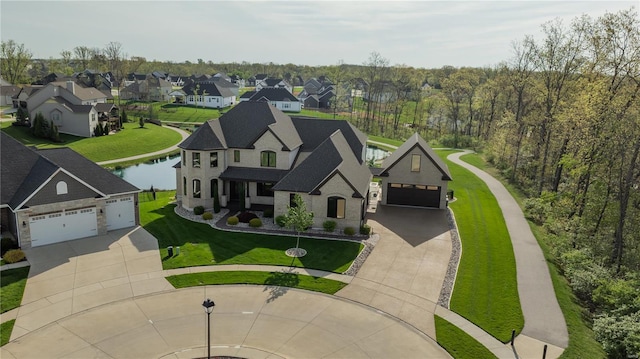 birds eye view of property with a residential view