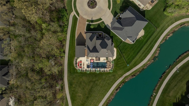 bird's eye view with a water view