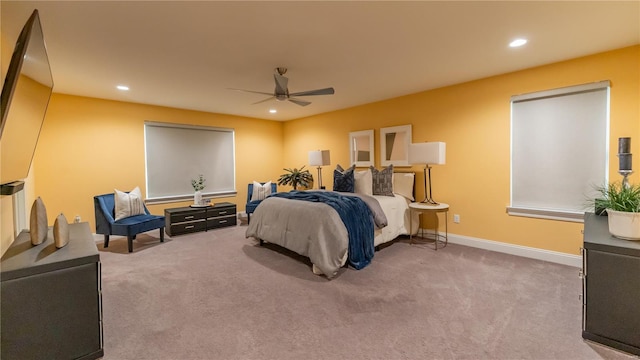 carpeted bedroom with baseboards, ceiling fan, and recessed lighting