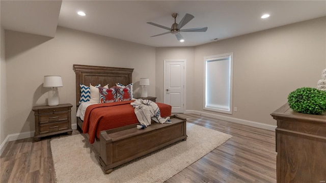 bedroom with recessed lighting, baseboards, ceiling fan, and light wood finished floors