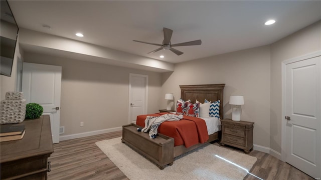 bedroom featuring recessed lighting, baseboards, and light wood-style flooring