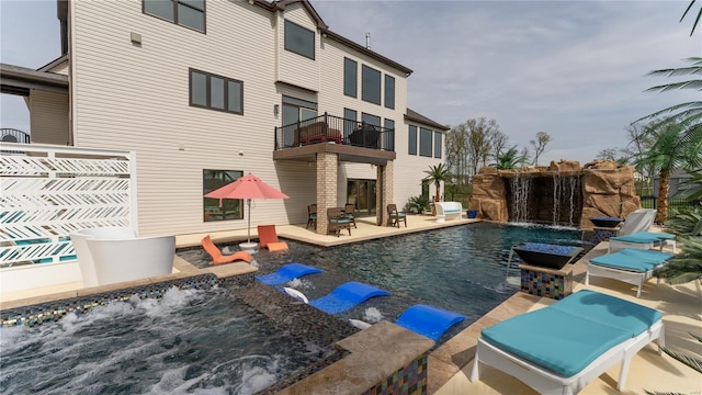 view of swimming pool with a fenced in pool and a patio