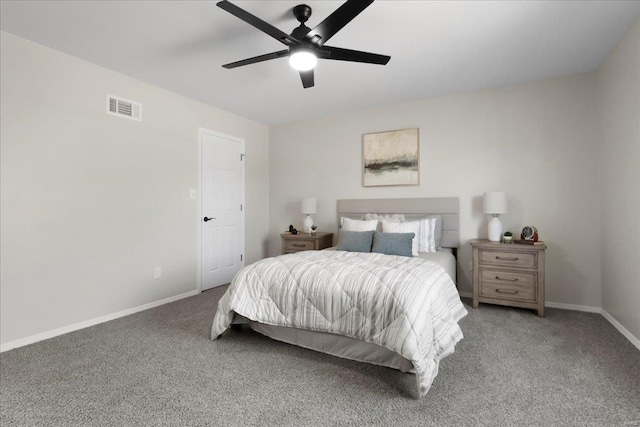 bedroom with a ceiling fan, carpet flooring, visible vents, and baseboards