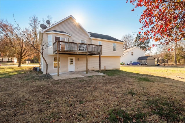 back of property with a patio, a yard, cooling unit, and a wooden deck