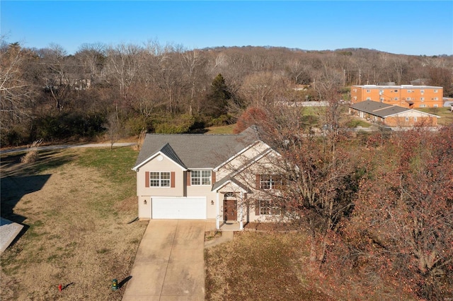 aerial view with a wooded view