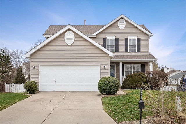 front facade featuring a garage and a front lawn