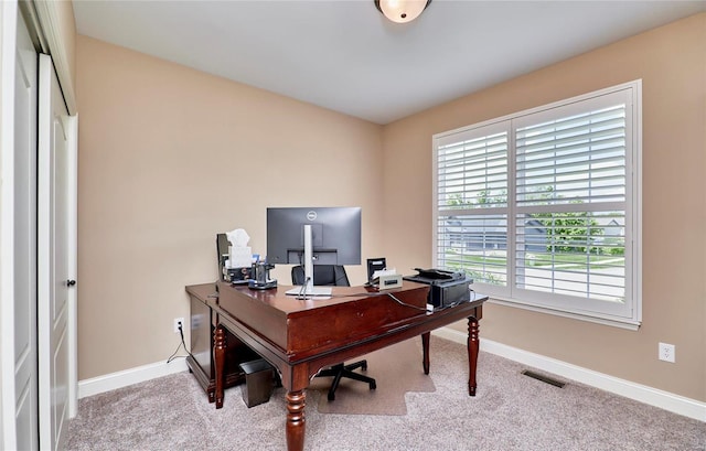 view of carpeted office space