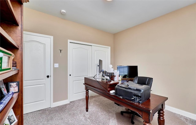 home office featuring carpet flooring