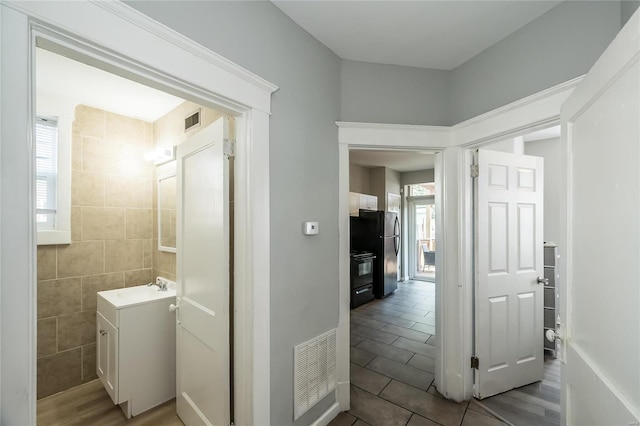 bathroom featuring wood-type flooring