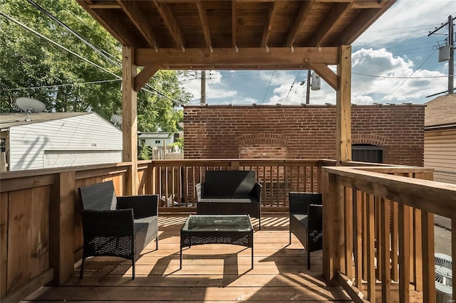 wooden terrace featuring outdoor lounge area