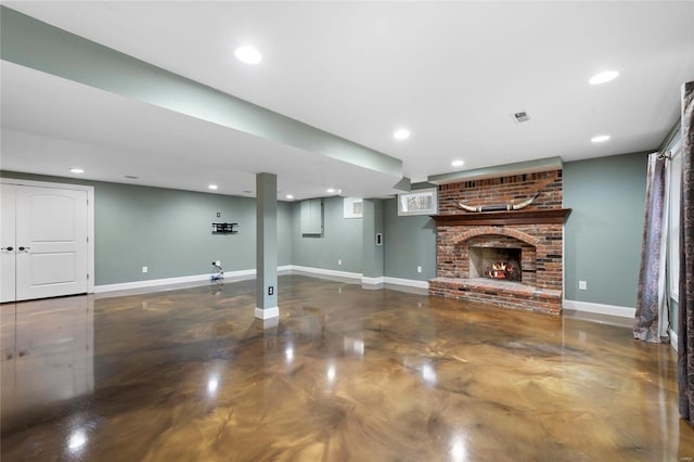 unfurnished living room with a brick fireplace