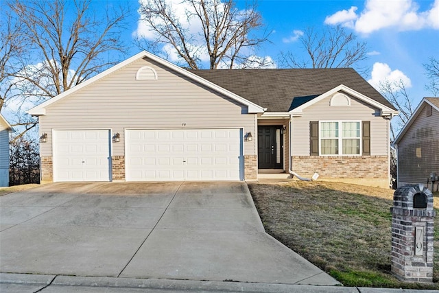 single story home featuring a garage