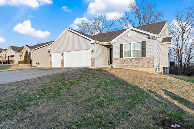 single story home featuring a garage and a front yard