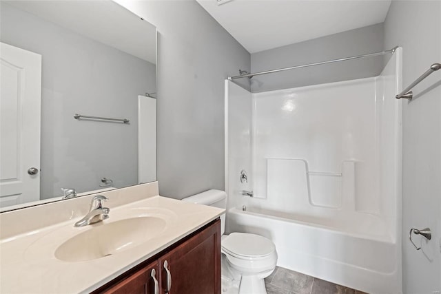 full bathroom featuring vanity, tub / shower combination, and toilet