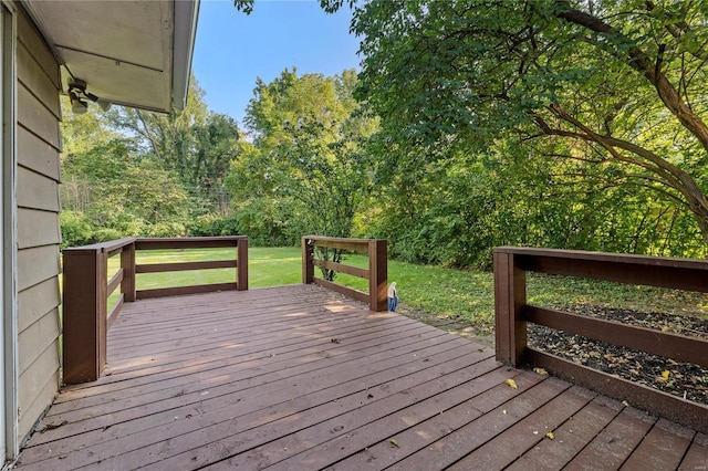 wooden deck with a yard