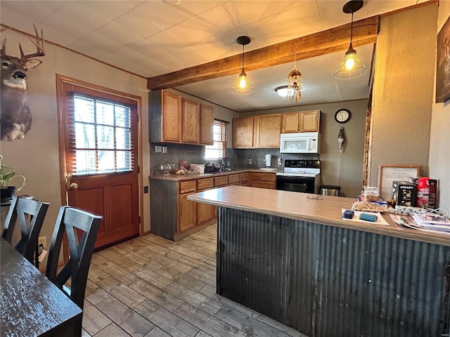 kitchen with beamed ceiling, decorative light fixtures, light wood-type flooring, range with electric cooktop, and backsplash