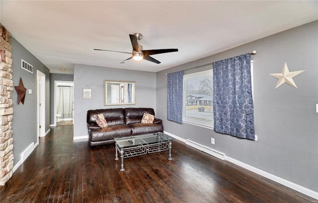 living room with ceiling fan, a baseboard radiator, and dark hardwood / wood-style flooring