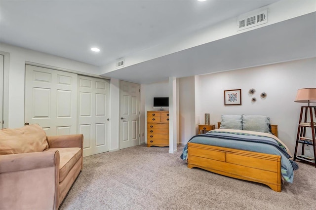 carpeted bedroom featuring a closet