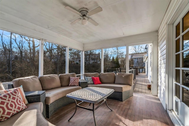 sunroom / solarium with ceiling fan