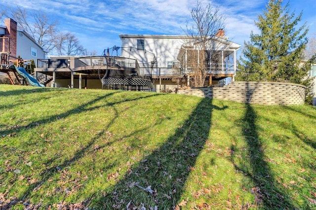 view of yard with a wooden deck