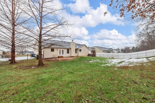 view of yard featuring a patio area and a fenced backyard