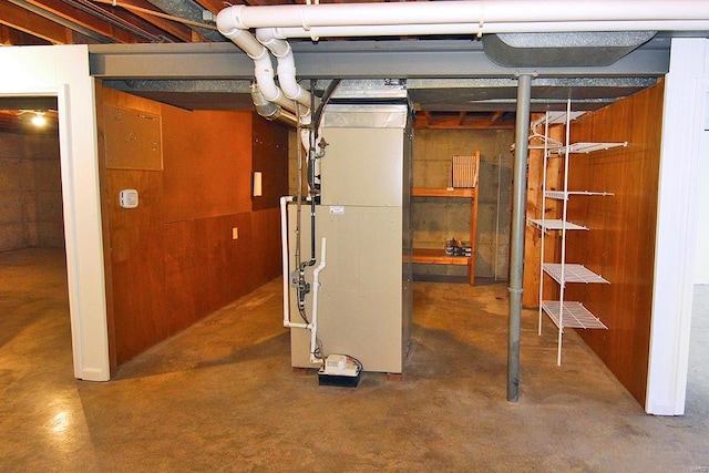 basement featuring heating unit