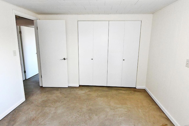 unfurnished bedroom with a closet